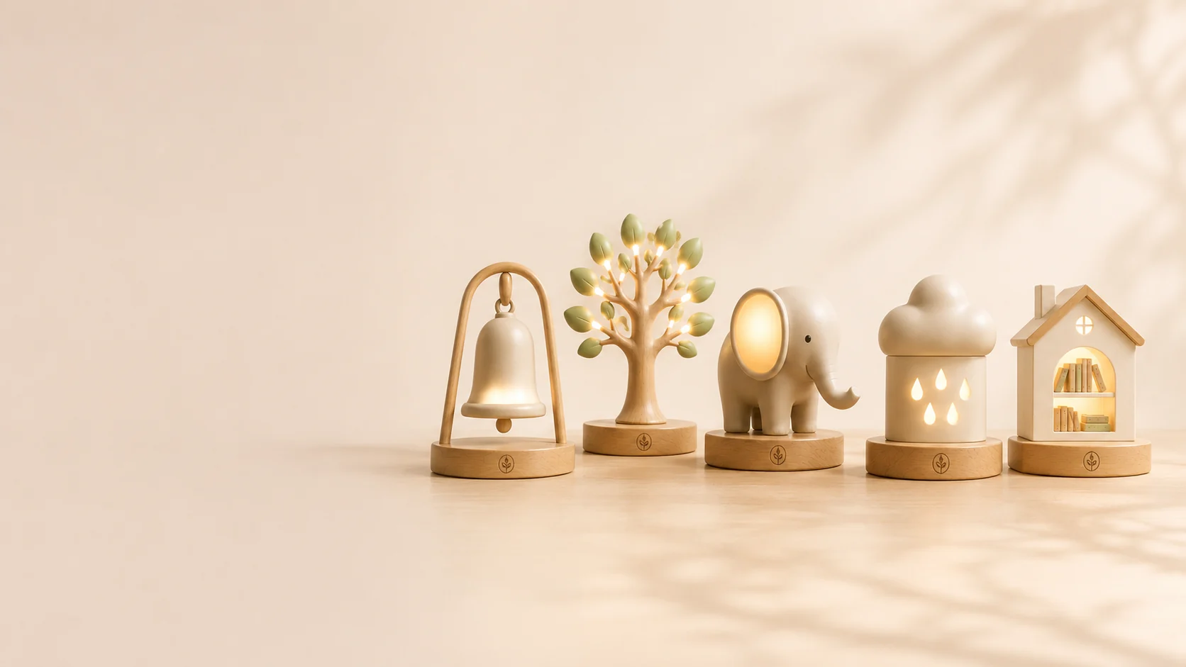 The GiveGlow collection: Hope Bell, Growing Tree, Guardian Elephant, Water Drop, and Little Library